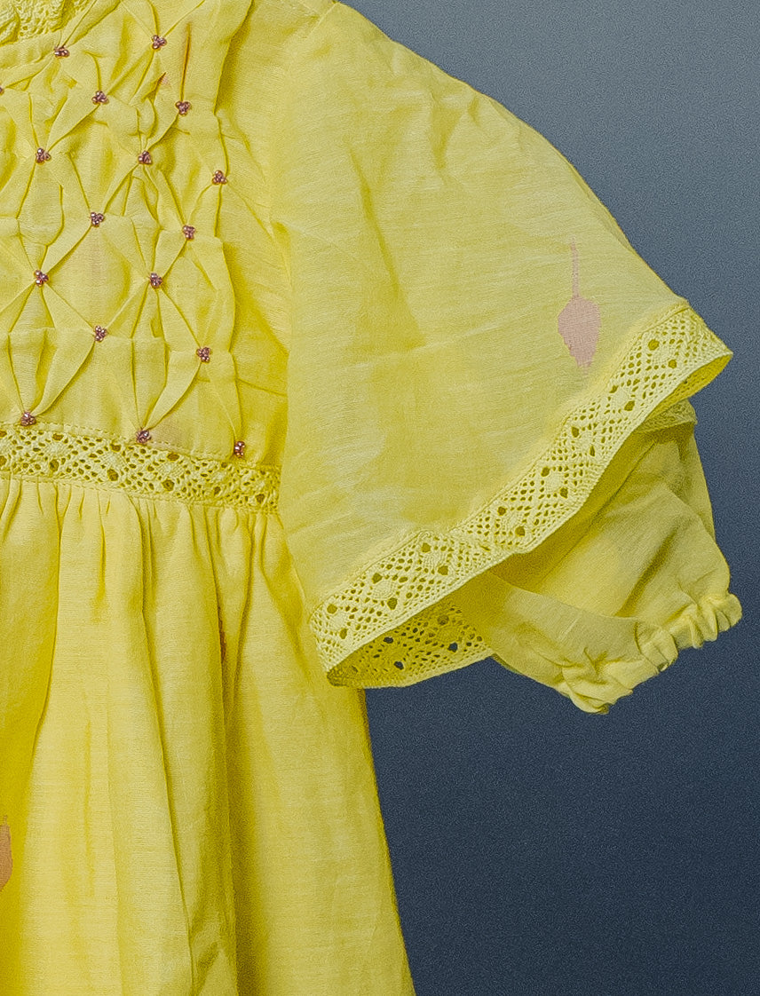 Kids girls yellow cotton jamdani hand smocked dress with beads detail