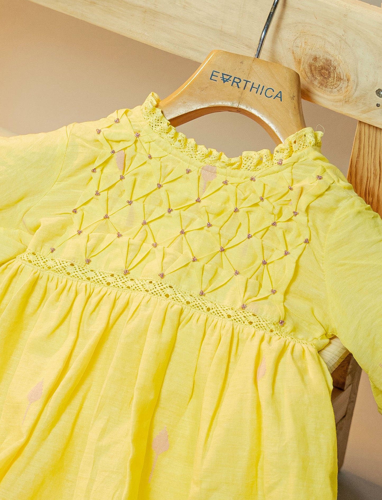 Kids girls yellow cotton jamdani hand smocked dress with beads detail