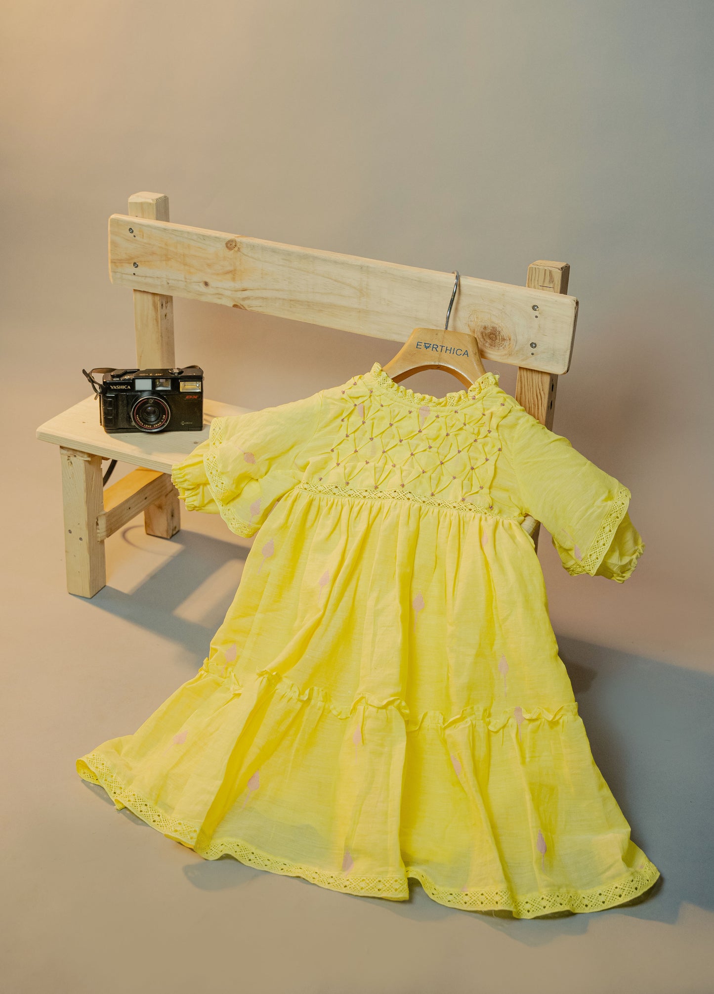 Kids girls yellow cotton jamdani hand smocked dress with beads detail