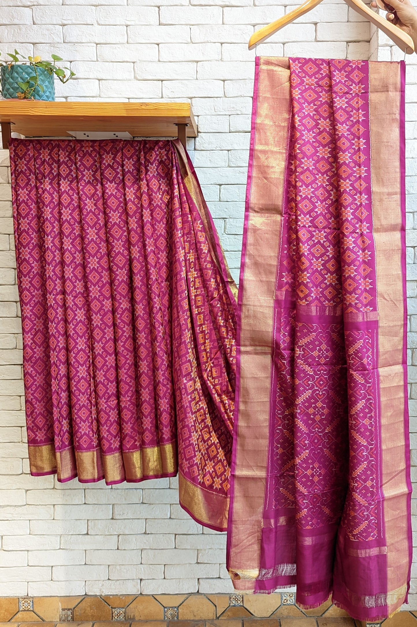 Handloom pure silk ikat telia motif saree in pink and orange