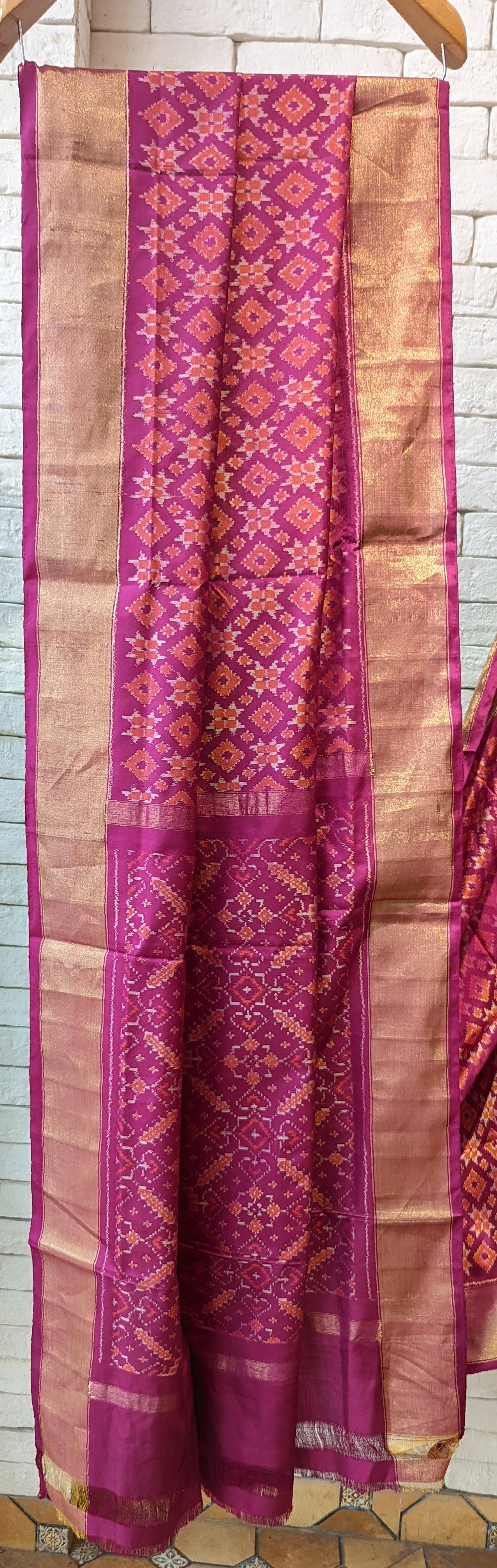 Handloom pure silk ikat telia motif saree in pink and orange