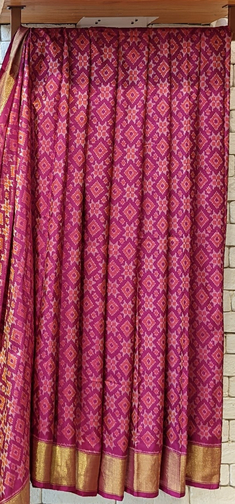 Handloom pure silk ikat telia motif saree in pink and orange