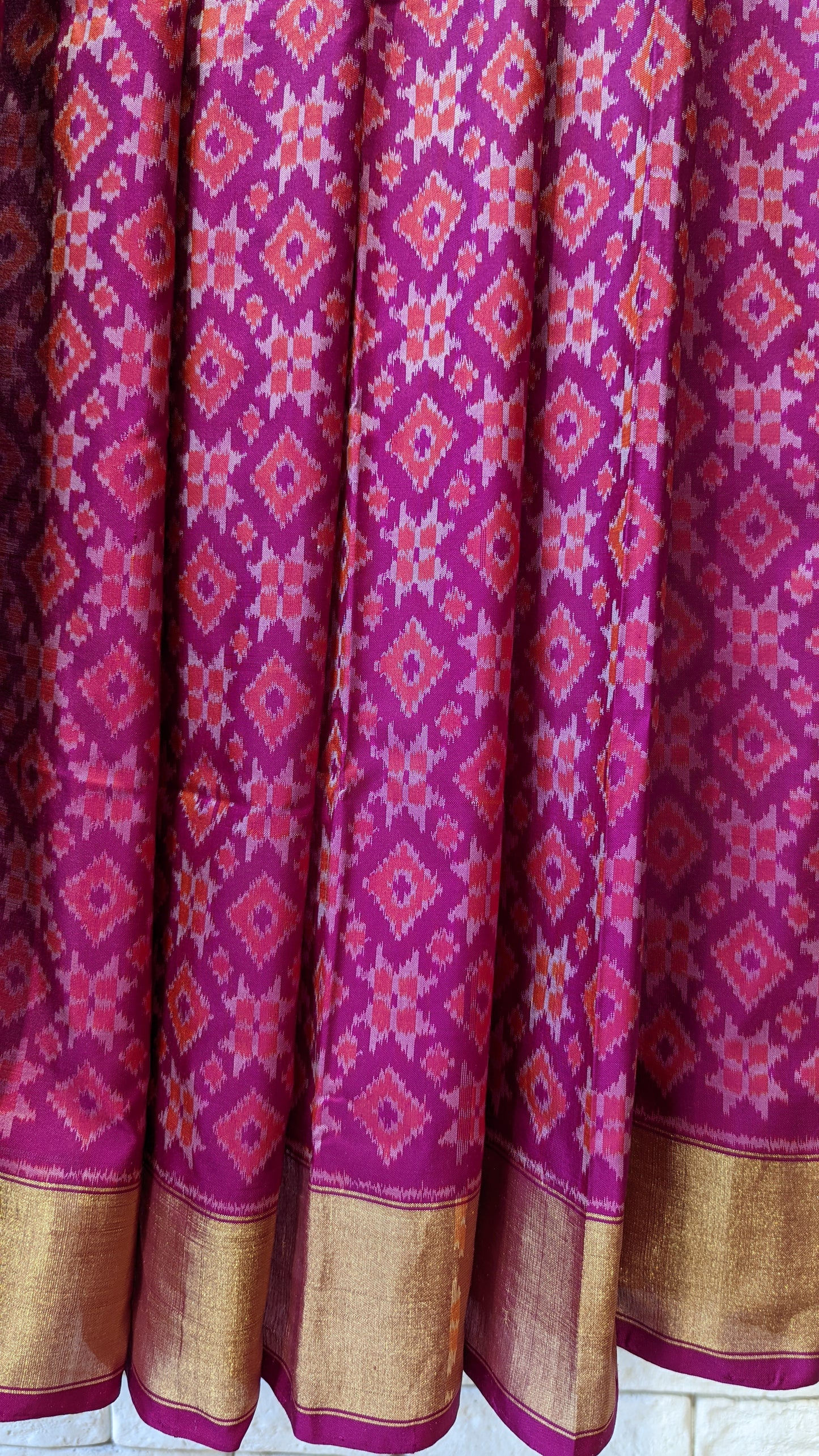 Handloom pure silk ikat telia motif saree in pink and orange